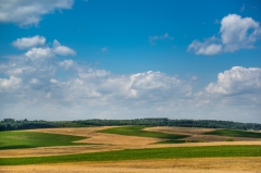 Blue Sky and Countryside Fields Background - High-quality free Photo from FreeArtBackgrounds.com