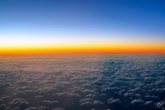 Sunset Sky Over the Clouds Background